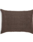 The Hunter Big Pillow by POM POM is a rectangular, brown hand-loomed linen pillow with slightly frayed edges—ideal for bringing earthy tones to your luxurious bedding.