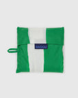 The Big Baggu by Baggu is a reusable shopping bag made from recycled ripstop nylon, folds into a square pouch, and features green and white vertical stripes, a left-side loop, and blue "BAGGU" label—ideal for travel or daily errands.