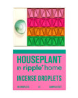 An open box displays Houseplant by Ripple/ Incense Droplets from Faire in pink, orange, and green rows. The lid reads "HOUSEPLANT by ripple+ home INCENSE DROPLETS SAMPLER SET," ideal for modern home fragrance.