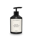 A black pump bottle of Faire Inspired Hand Soap, 300ml/10 fl. oz., with a diptyque-inspired design and "Baies Currants Quince" scent, is shown against a white background.