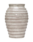 The Import Collection's 38-429 Jaxton Short Vase features a silver-toned finish, rounded shape, and horizontal textured stripes—blending timeless elegance with quality ceramic craftsmanship.
