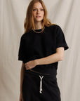 Perfectwhitetee Kennedy SS Crew Sweatshirt and drawstring pants in beige, modeled in a neutral studio setting.