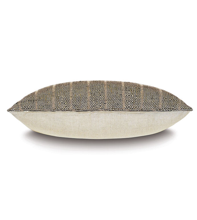 The Kimahri pillow by Eastern Accents is rectangular with a beige bottom and a patterned top featuring black geometric diamonds and greenish stripes, shown in side view against a white background.