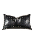 The Eastern Accents NAILHEAD DECO is a rectangular black faux leather accent pillow with small silver nailhead accents evenly spaced across the surface, displayed on a white background.