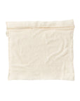 The Coyuchi Inc Organic Laundry Bag XL is a rectangular, off-white organic cotton mesh bag with a top zipper, shown lying flat on a white background.