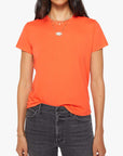 Mandarin red Mother’s The Lil Goodie Goodie Tee styled with layered necklaces and black jeans, front view.
