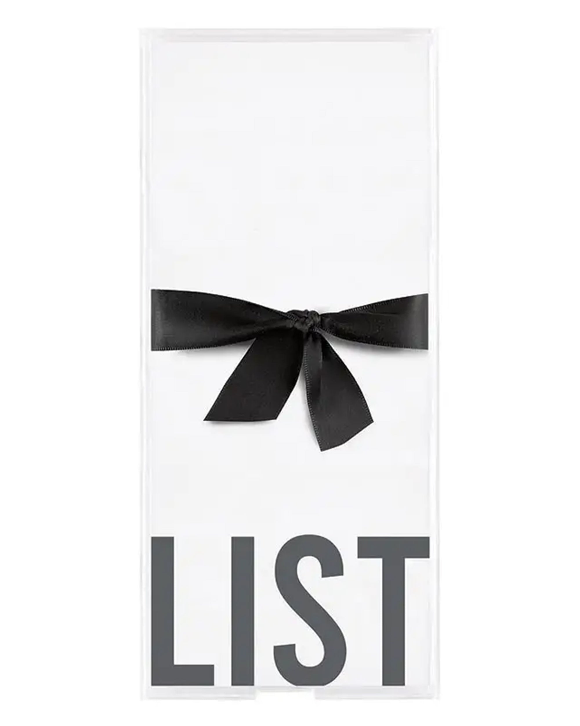 The Acrylic Notepaper Tray by Faire features heavyweight loose-leaf card stock with "LIST" in large gray letters and a black ribbon bow, making it a chic addition to any modern workspace. The background is white.