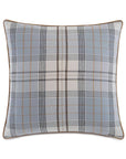 The Magnus Steel w/welt pillow by Eastern Accents features a gray, light blue, beige, and black plaid design with tan welt edges and a zipper closure.
