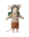 The Maileg Hiker Mouse by Maileg is a light gray stuffed toy with pink ears, a long tail, plaid bucket hat, striped shirt, brown shorts, and green backpack—charmingly dressed and ready for adventure.