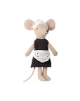 The Maileg Maid Mouse / Big Sister by Maileg stands upright on a plain white background, dressed in a black dress, a white eyelet apron, and a white bonnet.