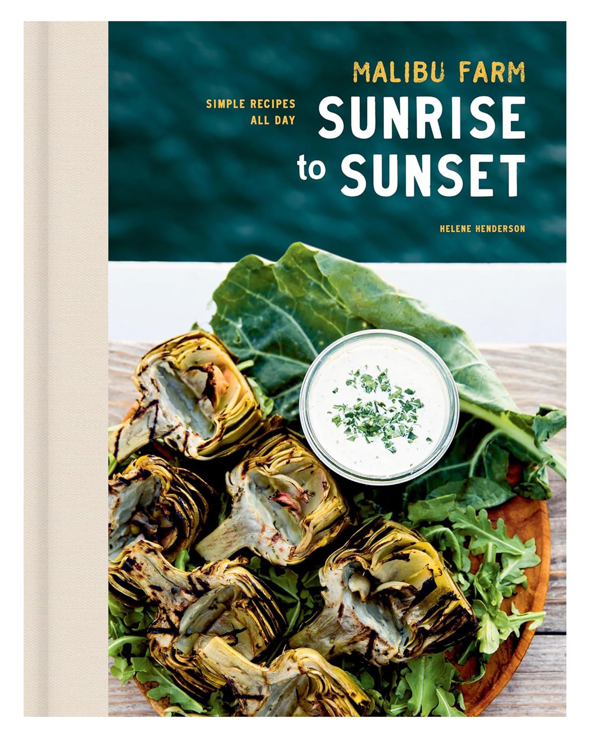 The cover of "Malibu Farm Sunrise" by Random House shows grilled artichoke halves, creamy dip, fresh greens, and an ocean view, capturing the spirit of Southern California cuisine.