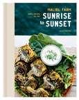 The cover of "Malibu Farm Sunrise" by Random House shows grilled artichoke halves, creamy dip, fresh greens, and an ocean view, capturing the spirit of Southern California cuisine.