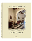 Book cover of "Creating A New Home In Mallorca" by Ingram Book Company features a Mallorca renovation with an elegant interior—black-and-white checkered floor, classic furniture, artwork, and arched ceilings.