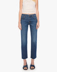 Mother’s dark blue Mid Rise Hiker Hover fray jeans styled with a white tank and dark sandals on a clean backdrop.