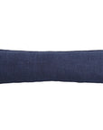 The Montauk Body Pillow by POM POM features a long, rectangular shape and a dark blue heavyweight linen cover, shown against a white background.