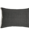 The Montauk Big Pillow 28x36 by POM POM is a rectangular, dark gray pillow with smooth fabric and hidden zipper closures, displayed against a white background.