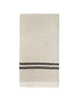 The Caravan Vintage Linen Towels Set-2 features neatly folded beige towels with black stripes, evoking classic Khadi tea towels—ideal for bringing rustic dining charm to your table. Displayed on a white background.