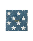 The My Mind's Eye Cocktail Paper Napkin features a blue background with large white stars and a small gold rectangular label, making it ideal for summer barbeques or festive holiday gatherings.
