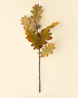 Faux oak leaf spray with blue butterfly on beige, eco-friendly autumn decor by Bungalow Furniture & Accessories.