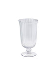 The Accent Decor 32722 Oster Vase S features clear glass with vertical ribbed texture, a rounded bowl, and a short stem on a wide flat base, displayed against a plain white background.