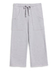 The Penny Sweatpant by Frank & Eileen features a light gray, wide-leg cropped design with an elastic drawstring waist and two large front pockets—crafted from soft fabric for casual days or lounging at home.