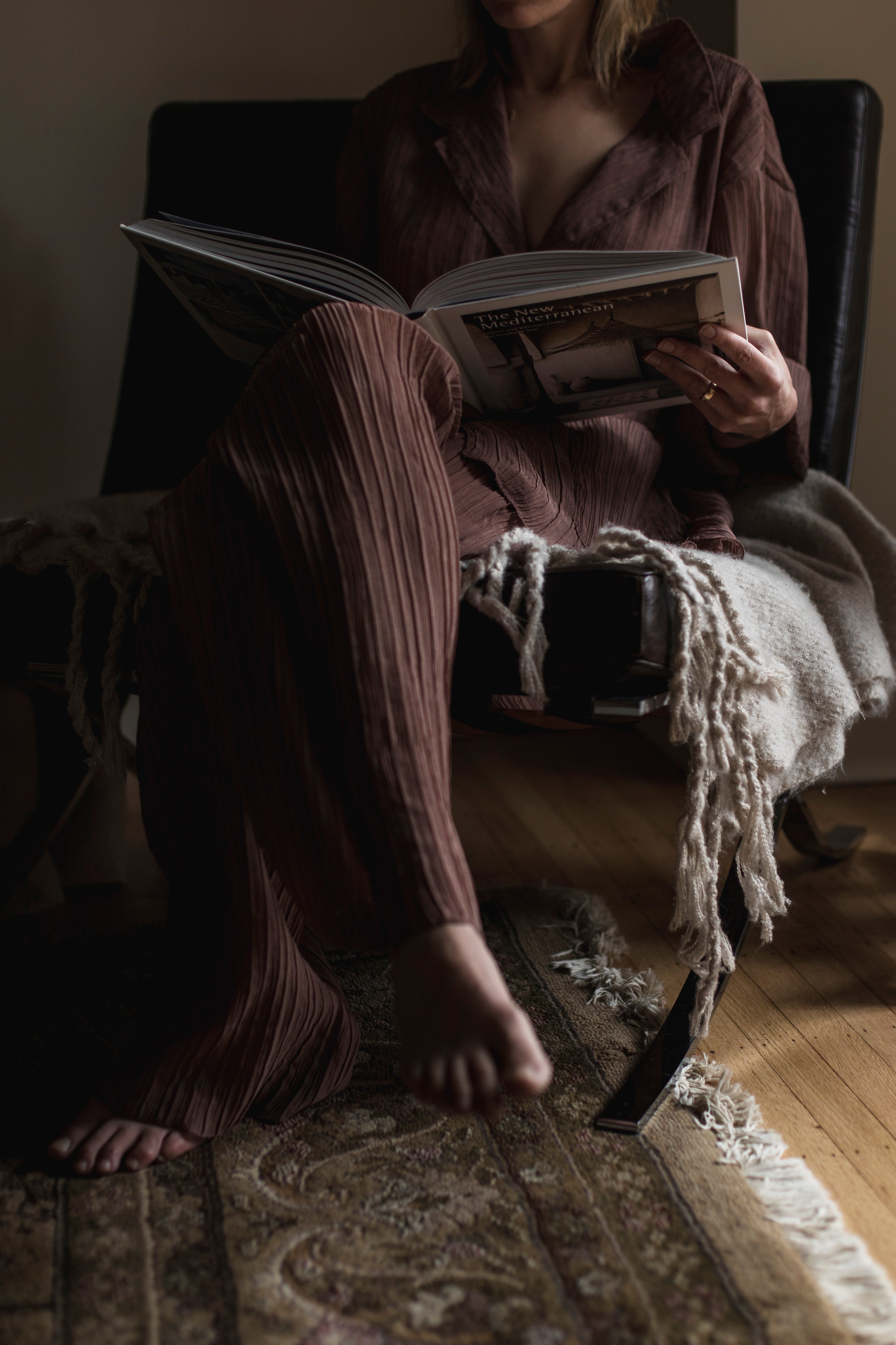 files/person-sits-reading-a-large-coffee-book.jpg