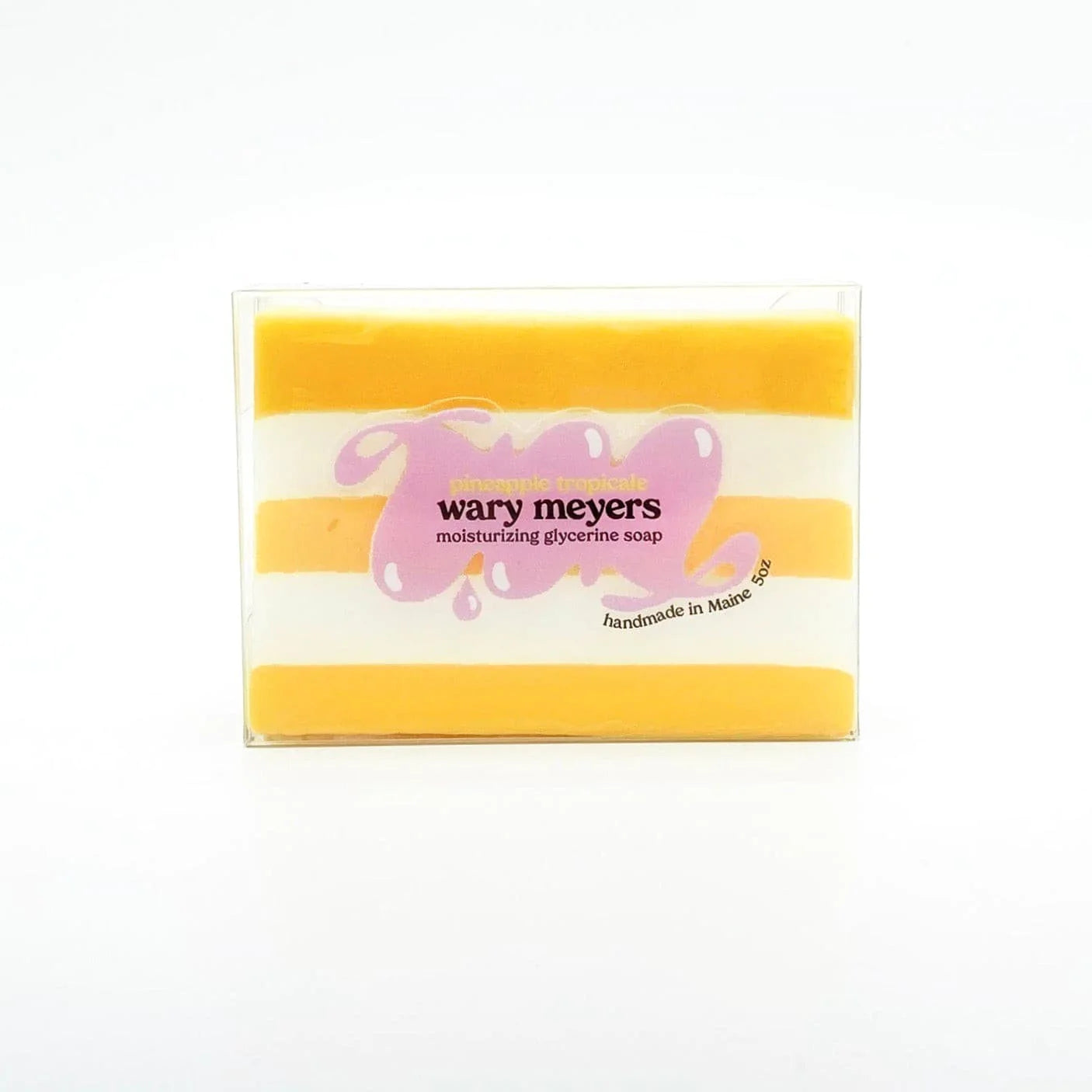 A bar of Wary Meyers Moisturizing Glycerine Soap, featuring horizontal yellow and white stripes, with the brand name and logo in a purple design, stating "handmade in Scottsdale Arizona.