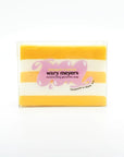 A bar of Wary Meyers Moisturizing Glycerine Soap, featuring horizontal yellow and white stripes, with the brand name and logo in a purple design, stating "handmade in Scottsdale Arizona.