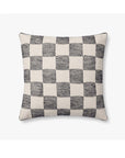 The Loloi Rugs Checkered Pillow 22x22 showcases a modern black and white checkerboard pattern with textured black squares and plain white squares—perfect as a stylish accent for any space.