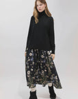 Psophia 2894 silk-blend floral skirt with waistband, styled with a black turtleneck and boots for a chic look.