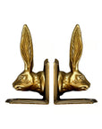 The Rabbit Bookend Set by Fox Run Brands features two gold-colored, heavy duty bookends shaped like rabbit heads with tall ears, facing each other—ideal decorative accents for any stylish shelf.