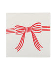 The My Mind's Eye Christmas Cocktail Napkin is white with a simple red bow and horizontal red lines extending from the knot, centered on the front.