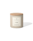 A beige 14oz. Rouge candle by Faire, featuring a wooden lid and white label, crafted from soy wax and inspired by Baccarat Rouge 540, is set against a white background with a soft shadow on the right side.