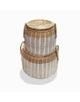 Two Faire BAM291 round baskets with straw handles, featuring a white and natural striped pattern, are stacked together.