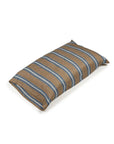 The Salem Pillow Case by Libeco Home features rectangular brown fabric with blue and light brown horizontal stripes, shown here on a white surface.