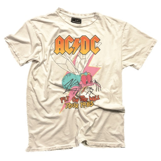 A vintage Not specified AC/DC Fly on the Wall Tee laid flat, featuring colorful band logo and &quot;Fly on the Wall Tour 1985&quot; text with a graphic of a fly, predominantly in pink and blue tones, purchased in Scottsdale Arizona.