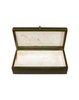 The Sarreid Gatsburg Shagreen Box is a rectangular, dark green leather storage box with a hinged lid, gold chain detail, and a white marbled interior that exudes transitional elegance.