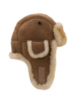 The Faire Shearling Trooper Hat features real brown leather, cream fleece lining, and ear flaps, shown in a side view against a white background.