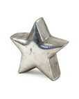 The Zentique Distressed Metallic Star features a smooth, reflective surface and stands upright on a white background—an ideal accent piece to elevate your home decor.