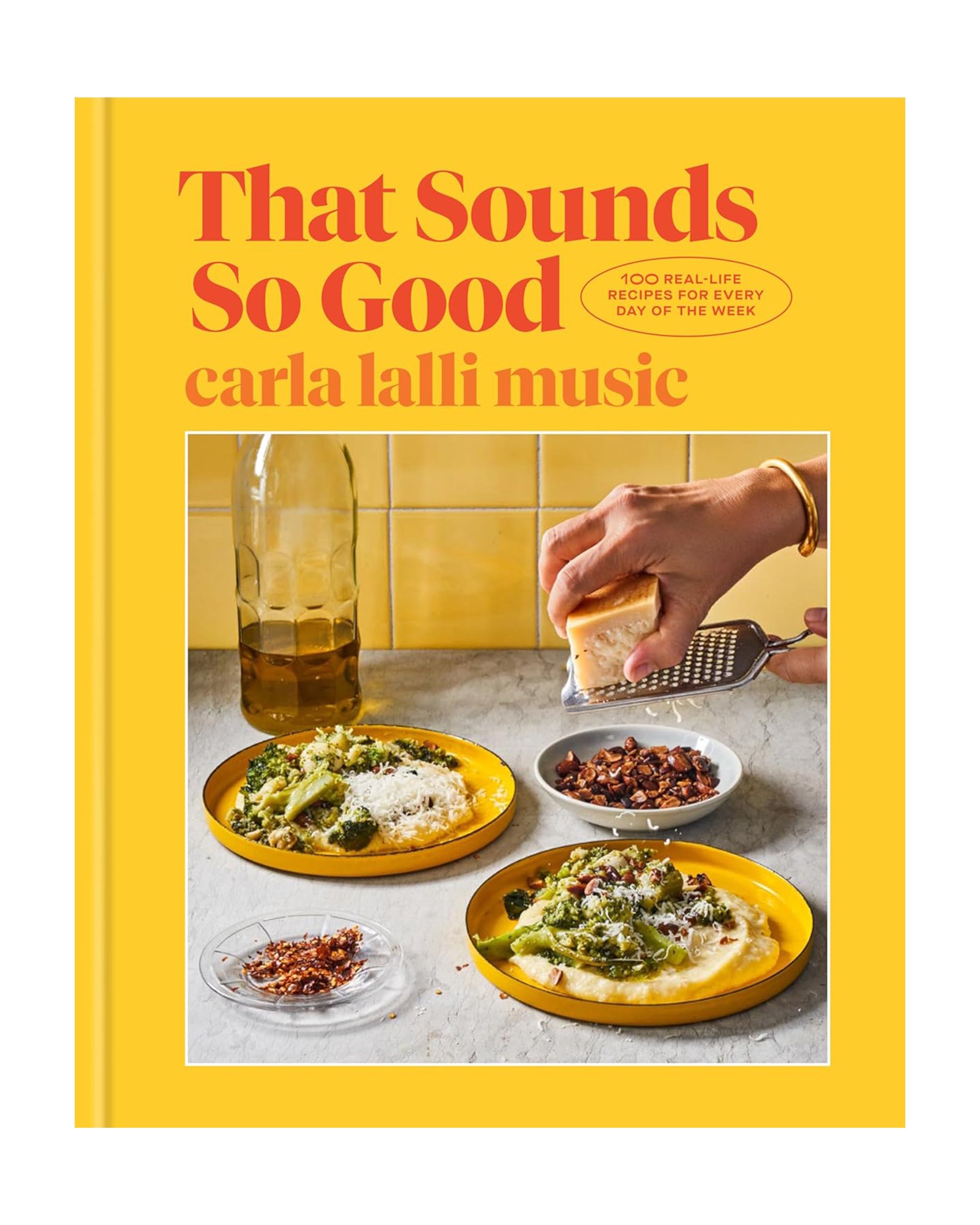 The cover of "That Sounds So Good" by Random House shows plates of pasta with grated cheese, a hand grating cheese, and an olive oil bottle on a yellow background.