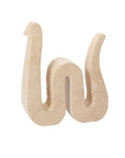 The Kingsnake Sculpture by Accent Decor is a beige, hand-carved travertine piece shaped like a lowercase “w” with elongated, curved ends—perfect as unique home decor against a white background.