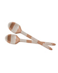 Two 50421 Botera Spoons with a cream and brown striped pattern are crossed on a white background, highlighting their elegant ceramic form and minimalist design.