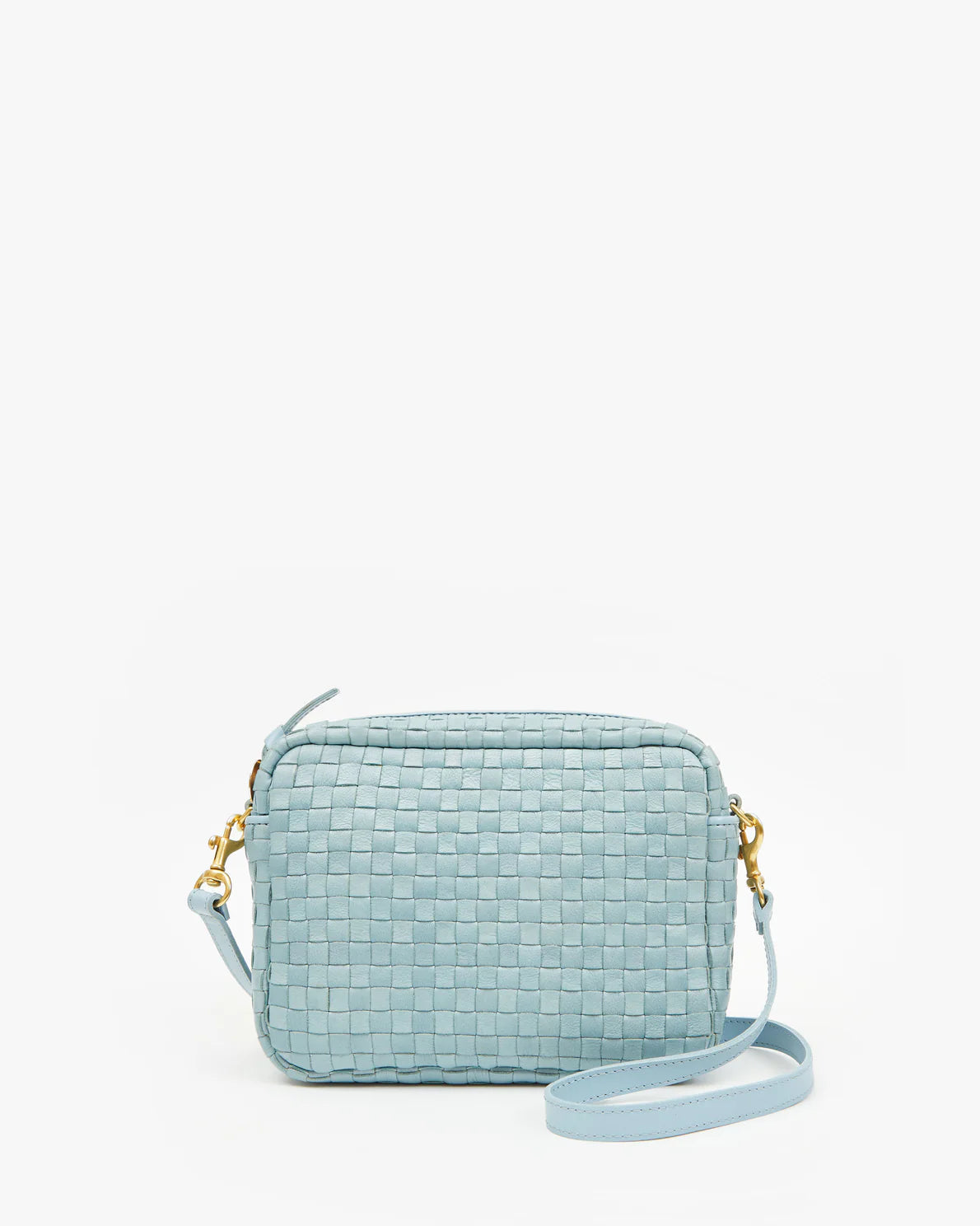 A light blue handwoven leather Clare Vivier Midi Sac crossbody bag with a gold zipper and a thin matching strap, displayed against a white background.