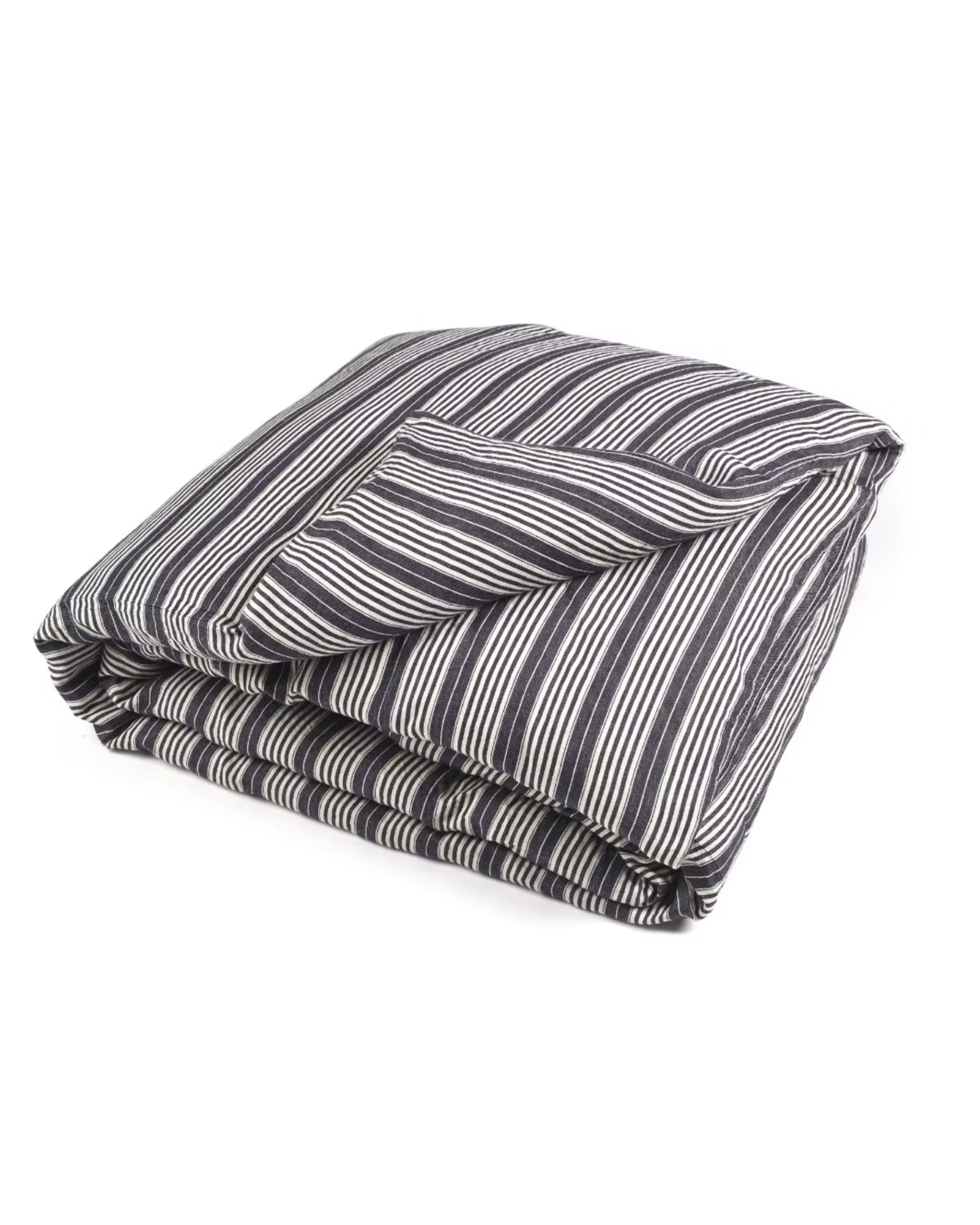 The Libeco Home Tack Stripe Duvet, crafted from soft linen and featuring a black and white stripe pattern, is neatly folded and displayed on a plain white background.