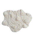 The Bloomingville AH3447 3'x3'8" tufted rug features a textured, irregular beige cotton and wool design with raised, wavy patterns and varying pile heights for an abstract look.