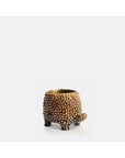 The Abigail Ahern C13-004 Tortoise Small Pot is a textured brown ceramic plant pot, shaped like a tortoise with four short legs and a rounded body, shown on a plain white background.