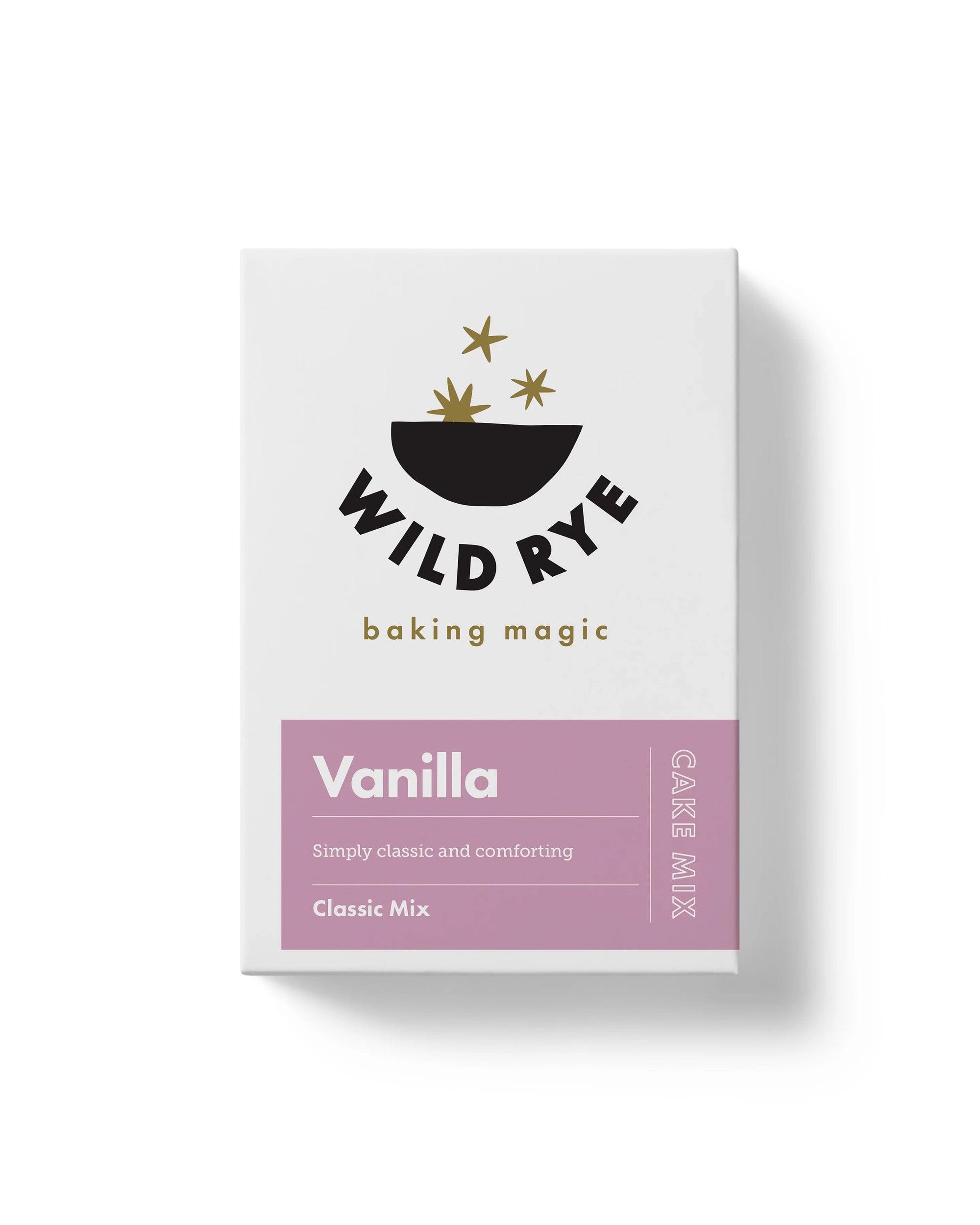 A white box of Wild Rye Cake Mix in classic vanilla flavor, featuring a black bowl with golden stars and a purple label marked "Vanilla" and "Classic Mix," made with smooth Madagascar vanilla.