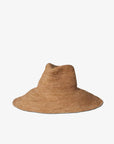 The Janessa Leone Waverly Sand is a light brown wide-brimmed raffia straw hat with a slightly tapered crown, shown against a plain white background.