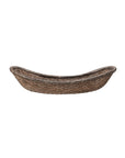 The Creative Co-op Woven Wicker Vintage basket features a shallow, oval shape with raised curved edges and an antique decorative wicker pattern, displayed against a white background.