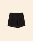 The Shayden Short by Xirena is a black terry cotton-blend sweat short with an elasticized waist, shown flat on a plain beige background.